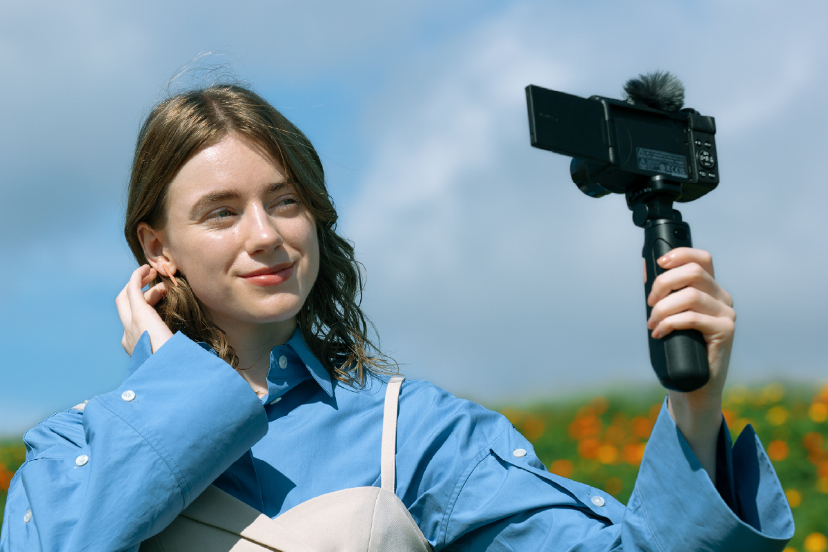 SELPHY QX20 and photo prints on a scrapbook