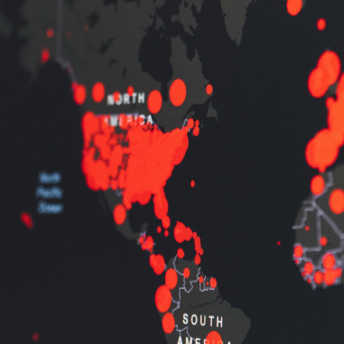 An illustrated map of cyber attacks activity represented by red circles