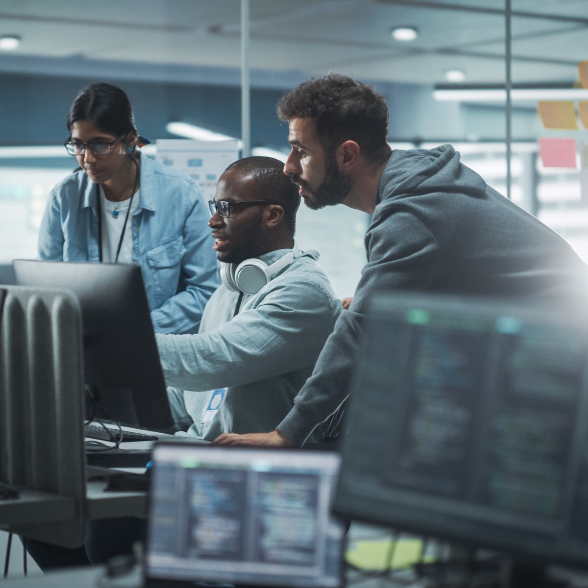 A team of IT experts guide their client through a cybersecurity training